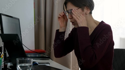 Woman working on laptop feels stressed about problems ar work, system virus, important data loss, outraged with website mistake, close up.