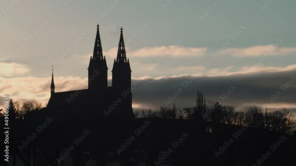 Timelapse of Vysehrad or Upper Castle in Prague, low angle silhouette, fast moving clouds over sky Timelapse of Vysehrad or Upper Castle in Prague, low angle silhouette, fast moving clouds over sky