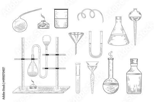 Sketch of a physics or chemical laboratory experiment and equipment. Vector pharmaceutical glass flasks, beakers and test tubes in old engraving style.