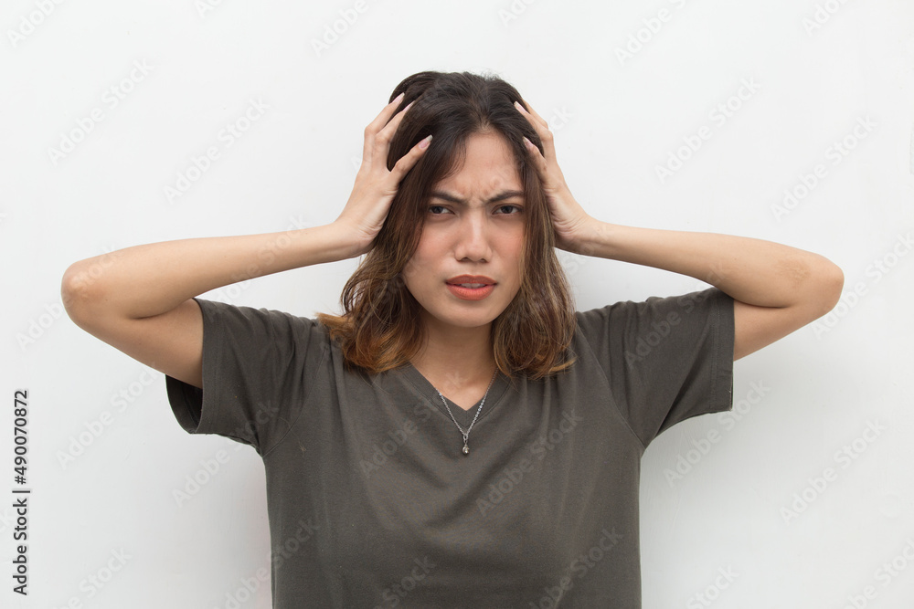 stressed sick asian beautiful woman with headache on white background stressed sick asian beautiful woman with headache on white background