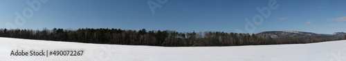 Panoramic scenic view of a field in winter in the Adirondacks