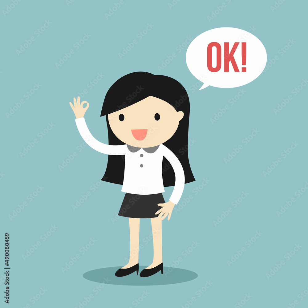 Business concept, business woman is doing OK gesture while saying 