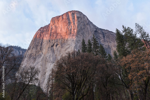 Sunset cast a soft pink light on the face of El Capitan.