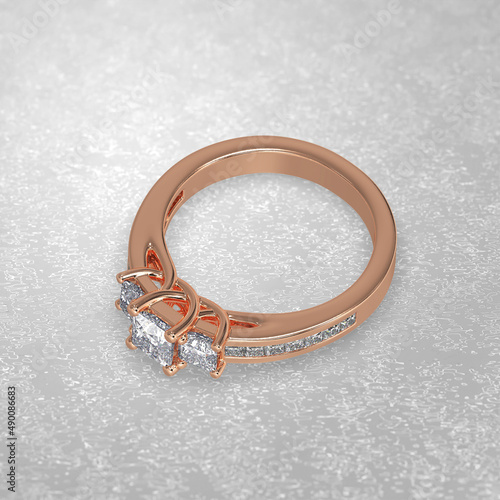 3 stone engagement ring laying down position in rose gold 3D render photo