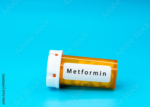 Metformin Medical vial with pills. Medical pills in orange Plastic Prescription. most popular medicine