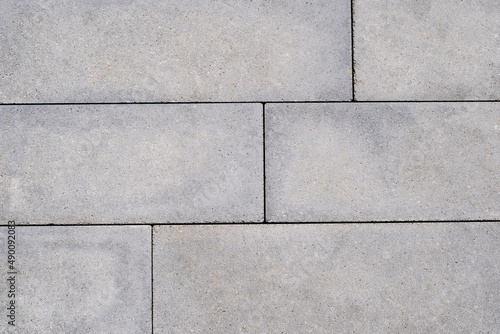 Close up, gray brown paving slab texture background.