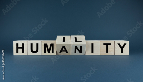 Cubes form the expression humility - humanity. Religion and spirituality concept photo