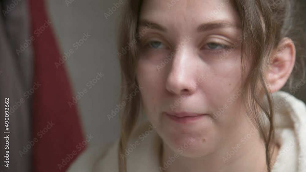 Caucasian Woman uses an interdental brush to clean the interdental spaces. Professional oral care. Correction of bite of teeth Caucasian Woman uses an interdental brush to clean the interdental spaces. Professional oral care. Correction of bite of teeth