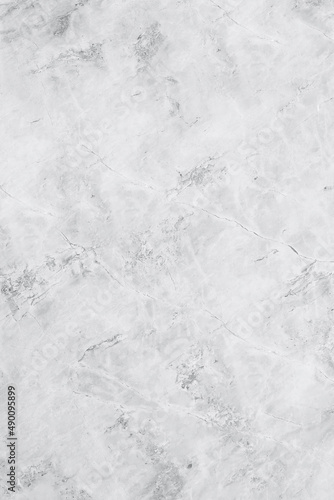 White marble texture background pattern top view. Tiles natural stone floor with high resolution. Luxury abstract patterns. Marbling design for banner, wallpaper, packaging design template. © Maksim