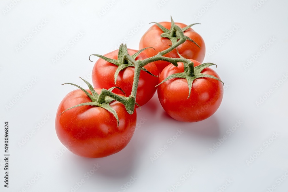 four tomatoes on a vinetomatoes on vine, vine, plant, vitamin, tasty, cherry, background, closeup, cooking, diet, food, four tomatoes, fresh, fresh tomatoes, freshness, green, health. white background four tomatoes on a vinetomatoes on vine, vine, plant, vitamin, tasty, cherry, background, closeup, cooking, diet, food, four tomatoes, fresh, fresh tomatoes, freshness, green, health. white background