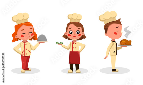 Cute children in uniform cooking tasty dishes set cartoon vector illustration