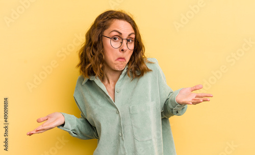 Obraz na plátně young pretty woman feeling clueless and confused, having no idea, absolutely puz