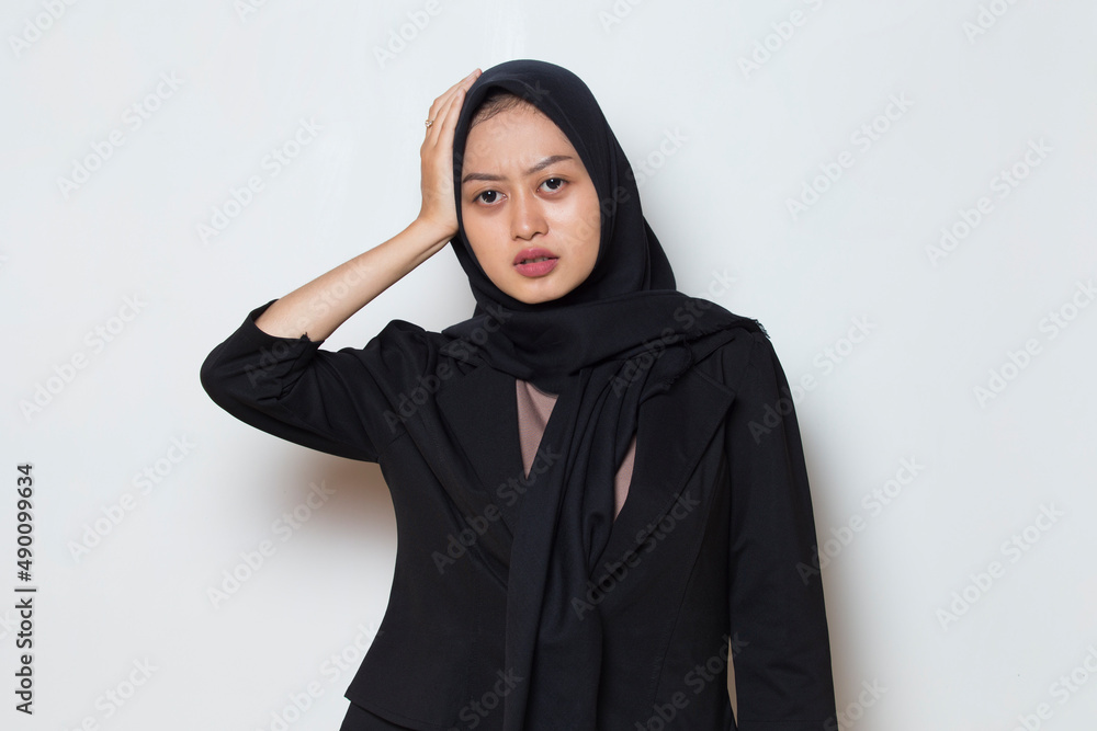 portrait of stressed sick muslim woman with headache
portrait of stressed sick muslim woman with headache
