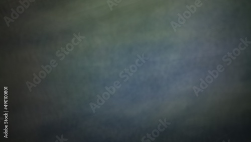 Abstract blur background with brown gray, black, white and earth tones.