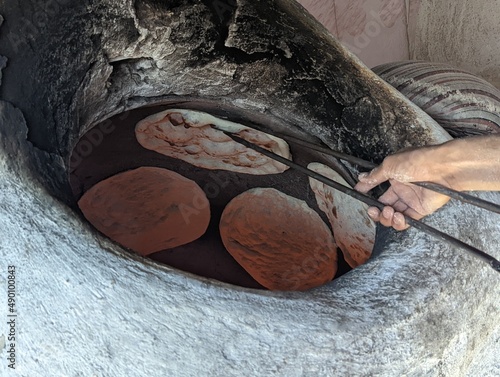photo of arabic bread bakery with clay oven