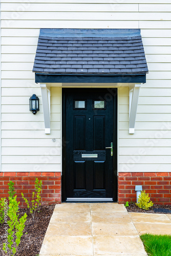 Close up of a front door on a brand new affordable home aimed at first time buyers to get them onto the housing ladder