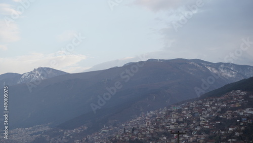 Mountain and City View in Cloudy Weather