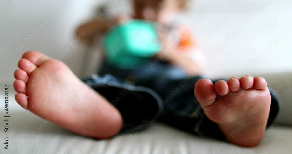 Baby toddler toes and feet close-up