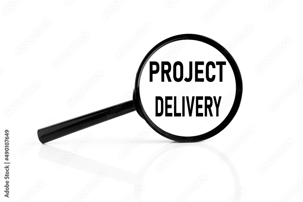 magnifier on a white background. text on glass. PROJECT DELIVERY magnifier on a white background. text on glass. PROJECT DELIVERY