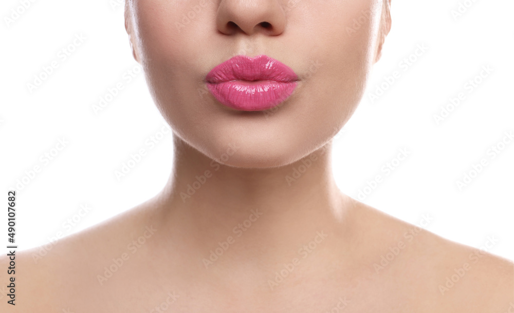 Closeup view of beautiful woman puckering lips for kiss on white background Closeup view of beautiful woman puckering lips for kiss on white background
