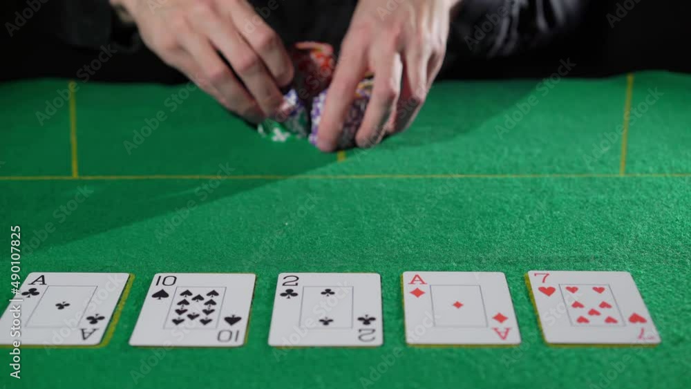 Gamer person playing poker in casino. Betting chips stacks. Dealer and gambler. Gamer person playing poker in casino. Betting chips stacks. Dealer and gambler.