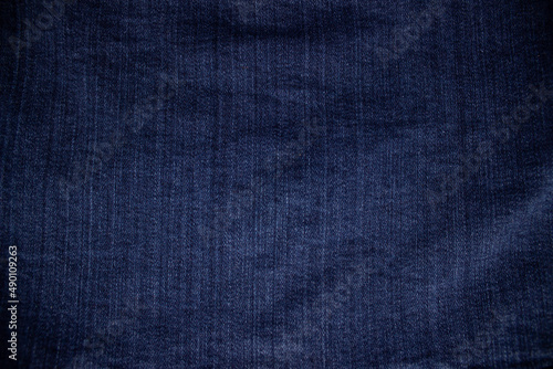 Close-up of the texture of blue jeans fabric.