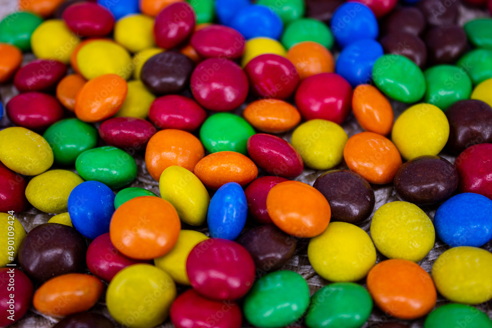 Small candies close-up. Background, multicolored dragees. Small candies close-up. Background, multicolored dragees.