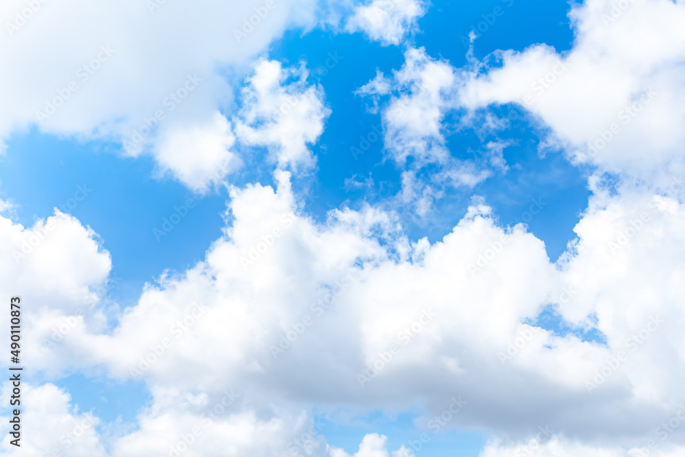 White clouds in the blue sky background. White clouds in the blue sky background.