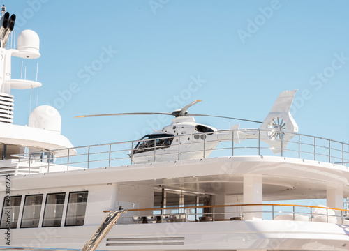 Helicopter landed on super yacht helideck on Monaco show