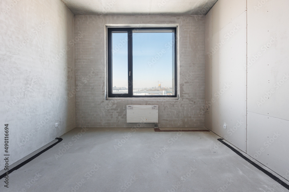 Obraz premium interior of the apartment without decoration in gray colors