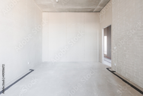 interior of the apartment without decoration in gray colors