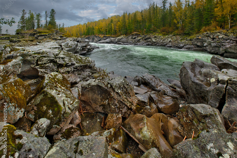 Russia. Eastern Sayans. Krasnoyarsk Territory. Bizarre rocks of uninhabited tributaries of the Kazyr River, which carries its waters into the Siberian Yenisei River. Russia. Eastern Sayans. Krasnoyarsk Territory. Bizarre rocks of uninhabited tributaries of the Kazyr River, which carries its waters into the Siberian Yenisei River.