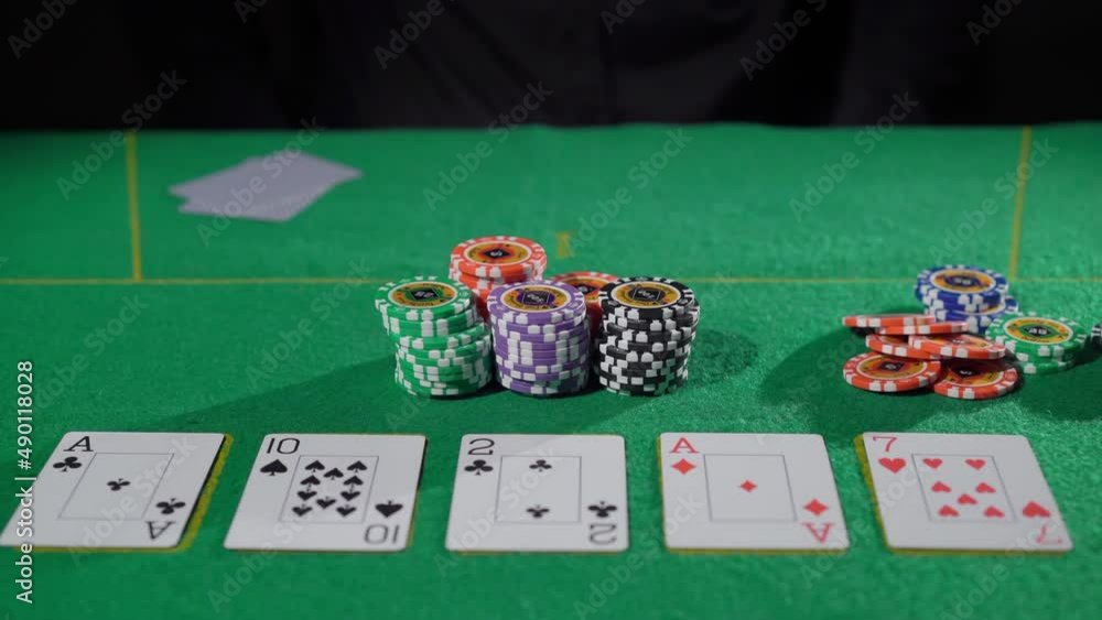 Gamer person playing poker in casino. Betting chips stacks. Dealer and gambler. Gamer person playing poker in casino. Betting chips stacks. Dealer and gambler.