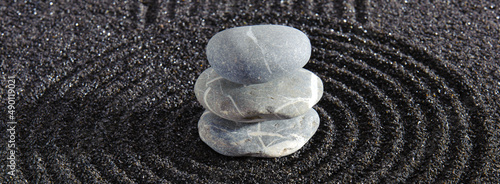 Canvas Print Japanese ZEN garden with yin yang stone in textured sand