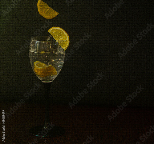  высокий бокал на длинной ножке с водой и лимоном, можно  использовать для вышивки