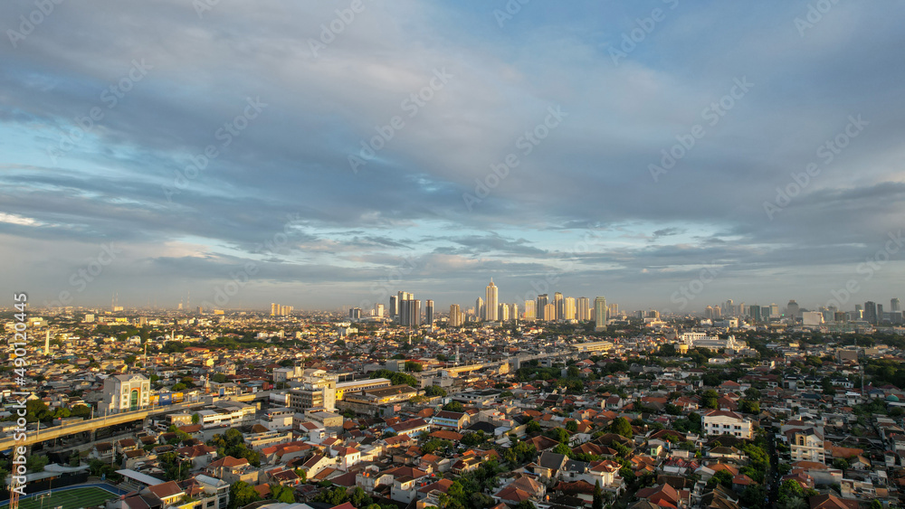 Obraz premium Aerial view of Jakarta Central Business District shot from a drone at sunrise. Jakarta, Indonesia, March 2, 2022