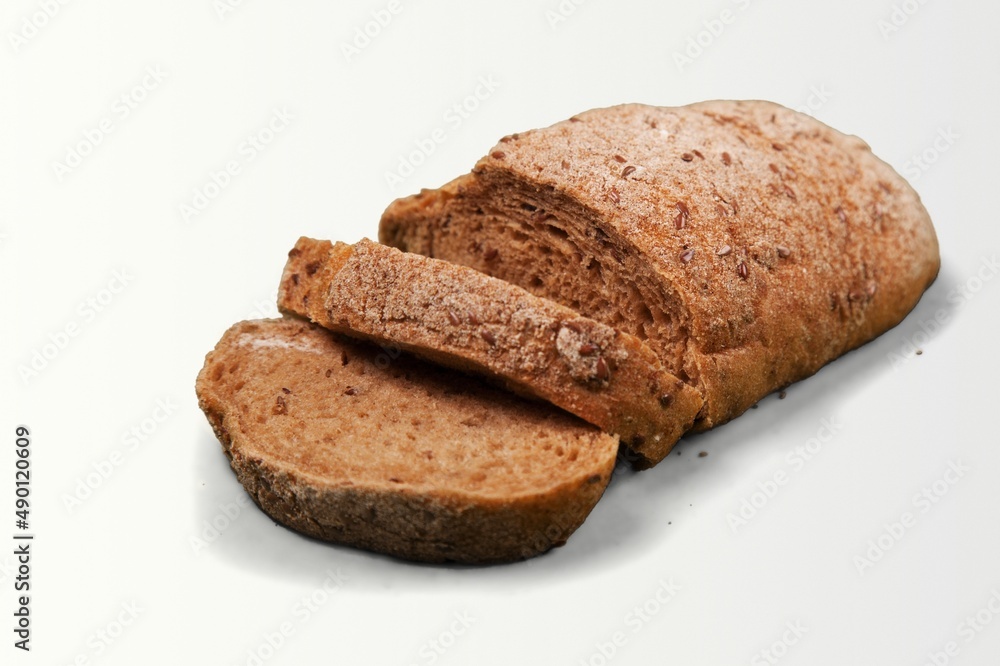 Freshly baked round Bread. Sliced, cutted wheat bread. Bakery, rustic traditional food concept. Freshly baked round Bread. Sliced, cutted wheat bread. Bakery, rustic traditional food concept.