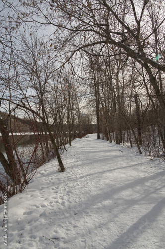 Snowy Hiking Trail by the River