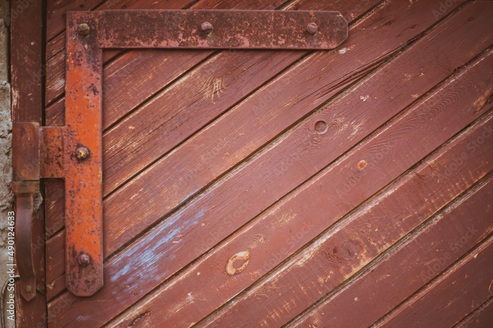 massive old red painted wooden double door or garage gate massive old red painted wooden double door or garage gate