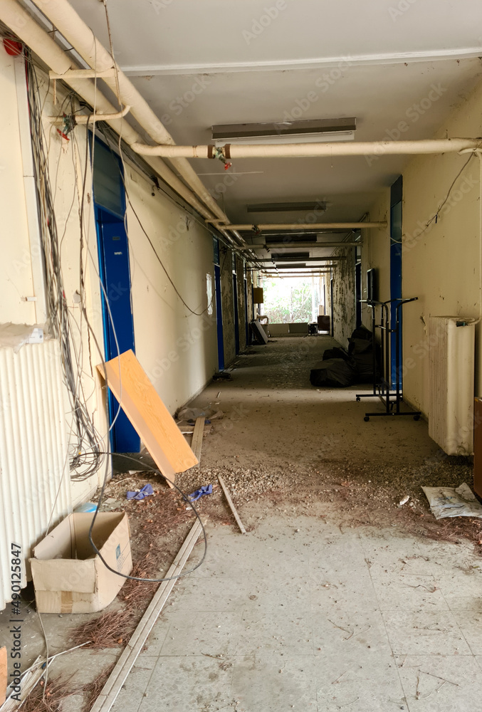 Fototapeta premium The inside of the abandoned and crumbling building.