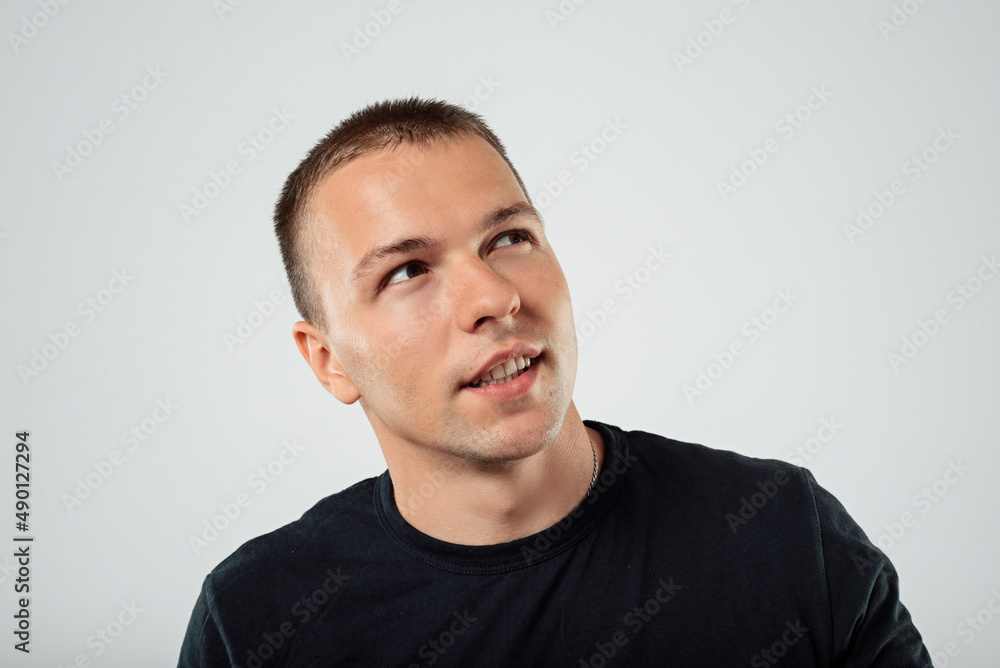 portrait of a young guy conceived, place for text portrait of a young guy conceived, place for text