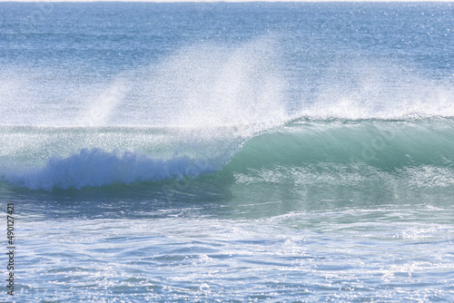 Wave breaking in the sea.