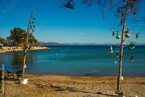 DATCA, TURKEY: Beautiful view from the beach to the sea and mountains in the town of Datca on a sunny day.