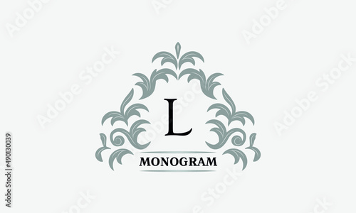 Monogram L. Luxurious floral logo with calligraphic elegant ornament lines. Business sign, identity for restaurant, boutique, cafe, hotel, heraldic, fashion and other vector illustrations