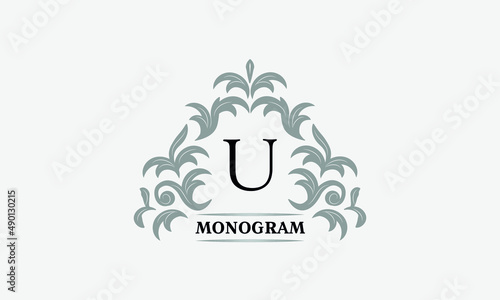 Monogram U. Luxurious floral logo with calligraphic elegant ornament lines. Business sign, identity for restaurant, boutique, cafe, hotel, heraldic, fashion and other vector illustrations