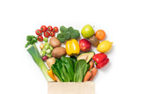 Healthy food background. Healthy food in paper bag vegetables and fruits on white. Food delivery, shopping food supermarket concept