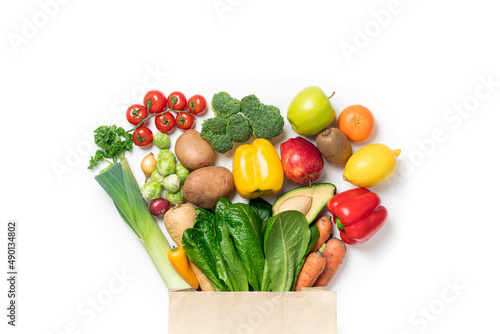 Fototapeta Naklejka Na Ścianę i Meble -  Healthy food background. Healthy food in paper bag vegetables and fruits on white. Food delivery, shopping food supermarket concept