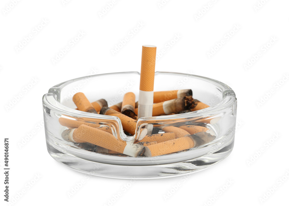 Glass ashtray with cigarette stubs isolated on white Glass ashtray with cigarette stubs isolated on white
