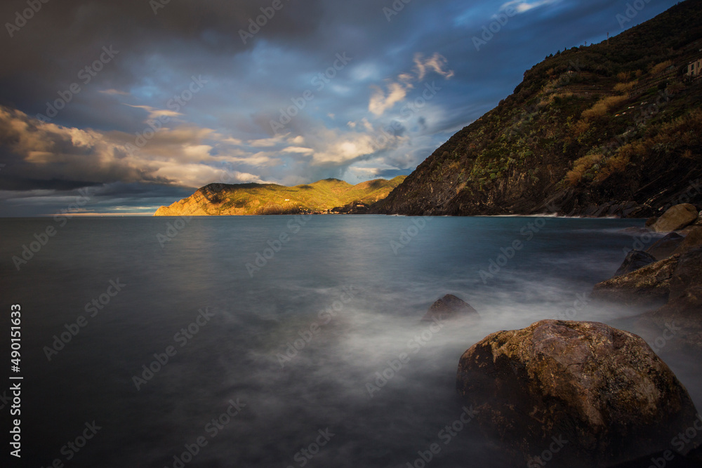 Fototapeta premium seascape and mountains at sunrise