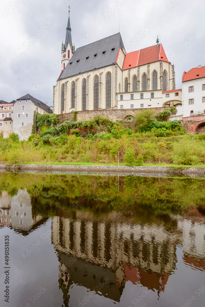 St. Vitus church reflected in Vltava river, Cesky Krumlov, Czech Republic